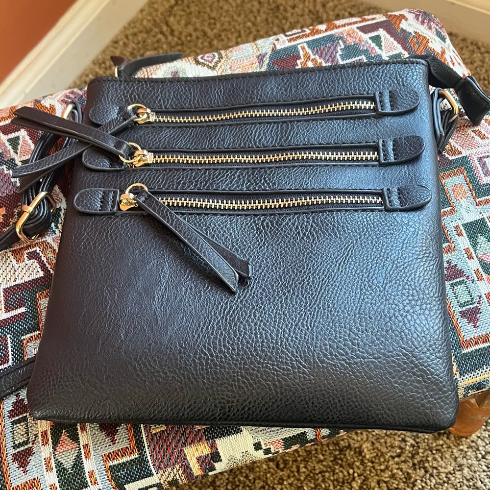 Zodiac Black Purse with Gold Zippers. Adjustable Shoulder Strap.